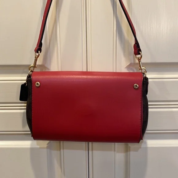 This is a like new coach cross body bag. - Picture 6 of 9